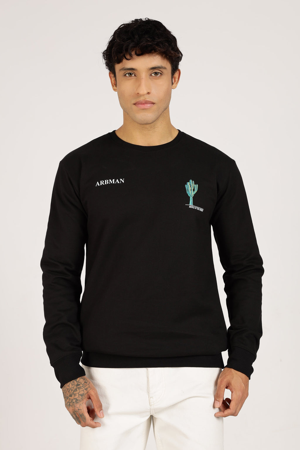 Man wearing a black long-sleeve shirt