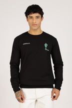 Man wearing a black long-sleeve shirt
