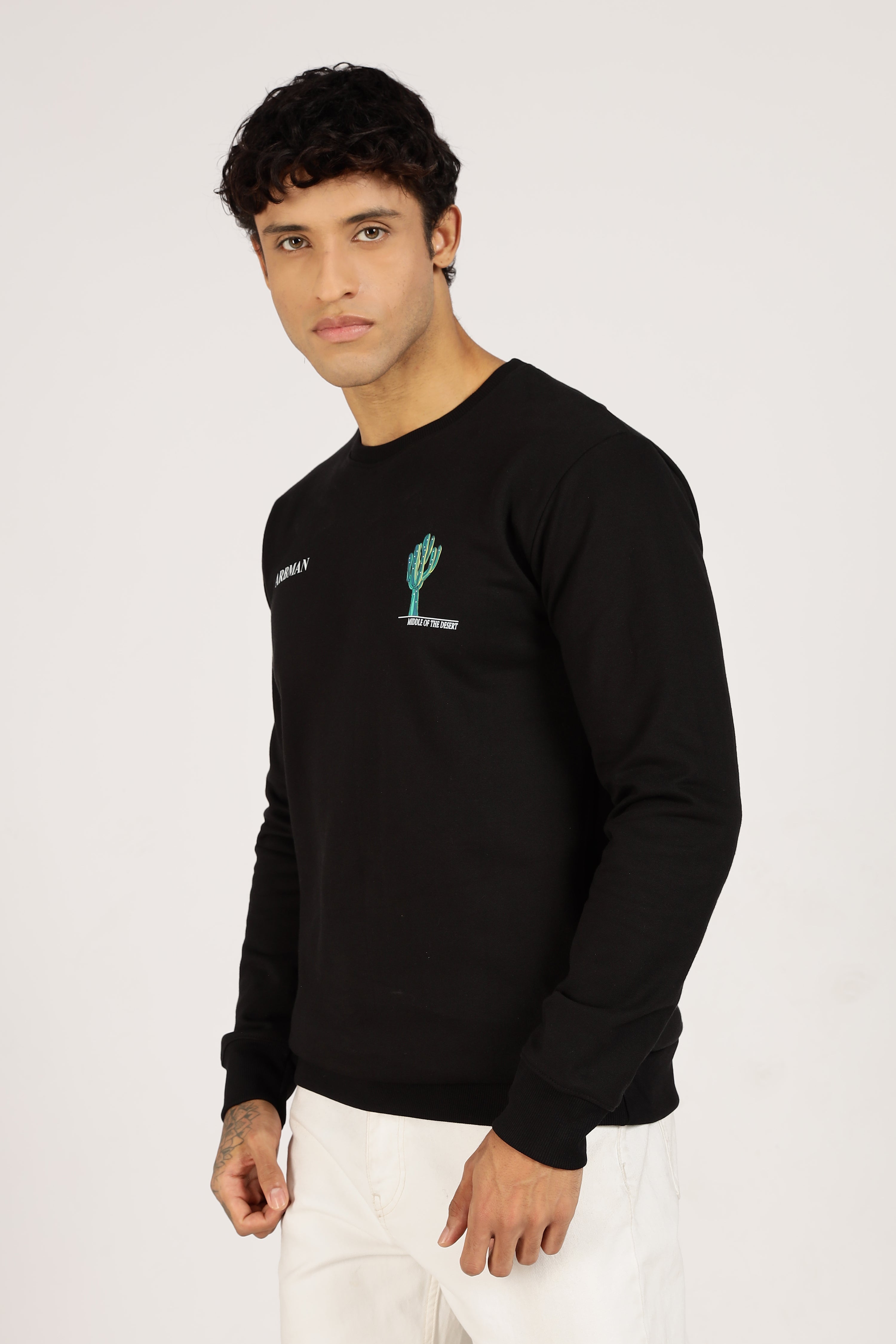 Man wearing a black long-sleeve shirt