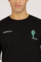 Man wearing a black long-sleeve shirt