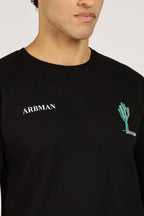 Man wearing a black long-sleeve shirt