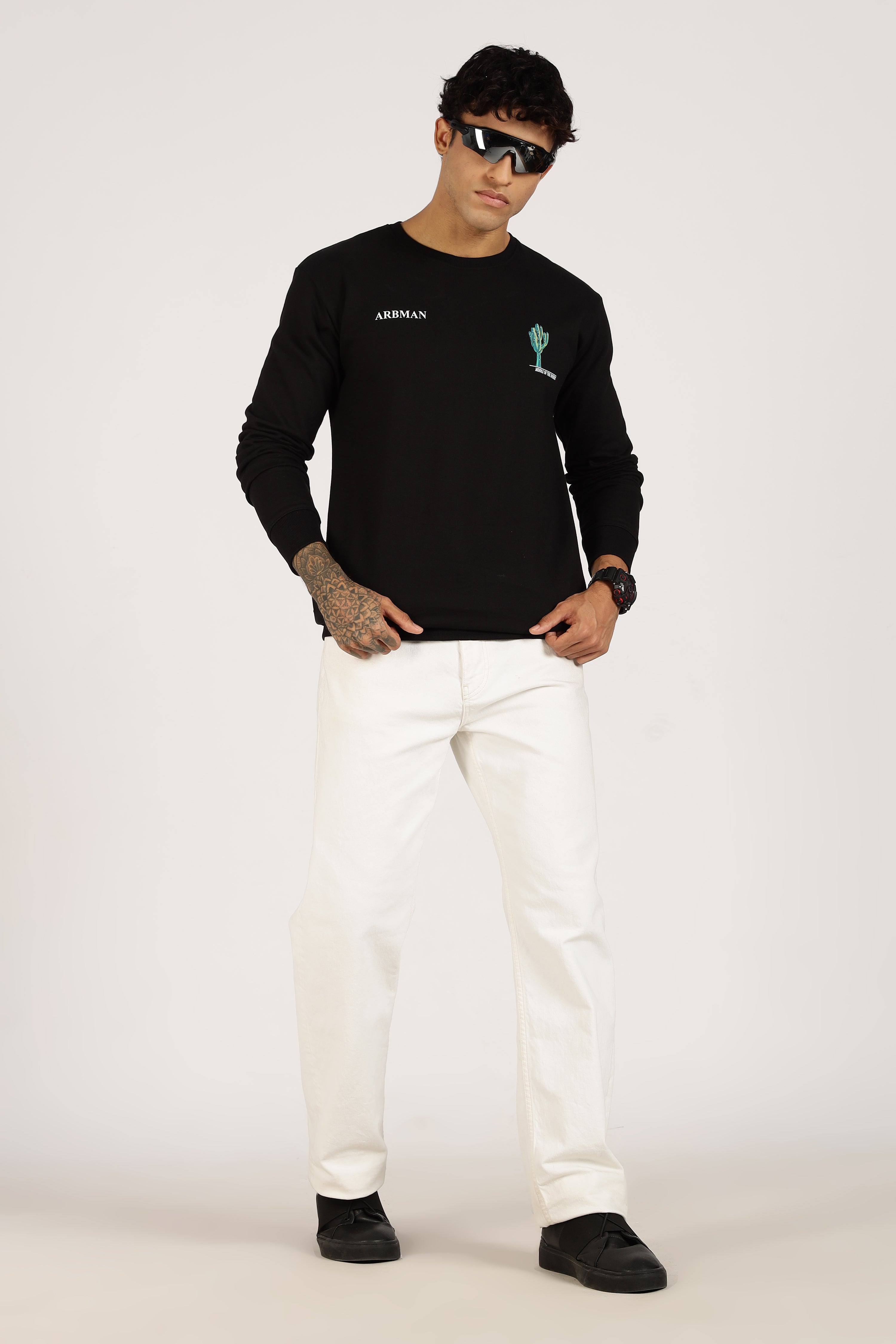 Man wearing a black long-sleeve shirt
