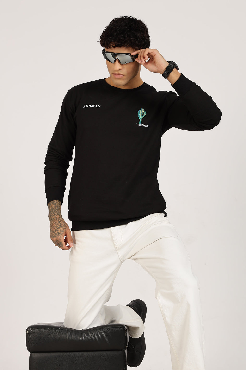 Man wearing a black long-sleeve shirt